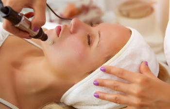 woman during facial treatment